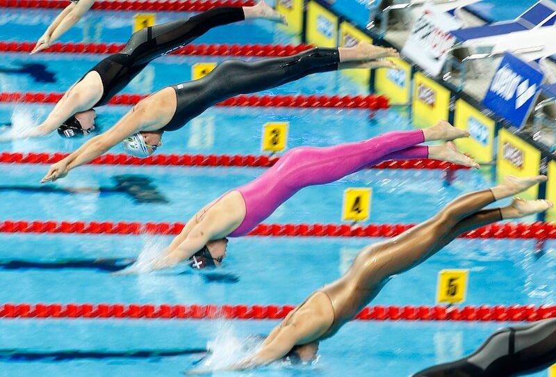 Swimmers of the fourth heat with Jeanette OTTESEN (pink suit) of Denmark, Laura LETRARI (above Ottesen) of Italy, Chantal GROOT (2 above Ottesen) of the Netherlands and Diane BUI DUYET (below Ottesen) of France start in the women's 50m Butterfly Heats at the 13th European Short Course Swimming Championships in Istanbul, Turkey, Friday, Dec. 11, 2009. (Photo by Patrick B. Kraemer / MAGICPBK)