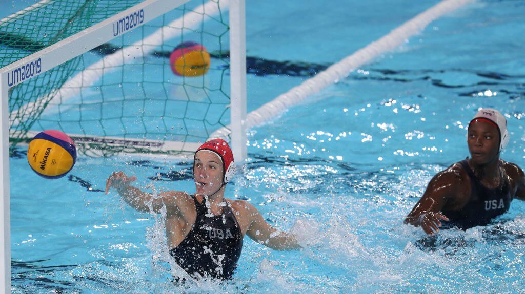 Lima, Thursday August 08, 2019 - Kiley Neushul (L) and Goalkeeper, Ashleig Johnson (R), from USA team play against players from Peru team in Women's Quarterfinal Water Polo match at Complejo Deportivo Villa Maria del Triunfo during Pan American Games Lima 2019. Copyright Vidal Tarqui / Lima 2019 Mandatory credits: Lima 2019 ** NO SALES ** NO ARCHIVES **