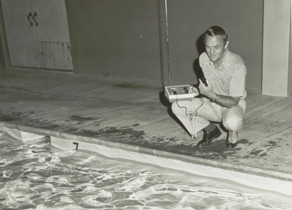Swimming World March 2020 - Lessons with the Legends - Cecil Colwin coaching on pool deck