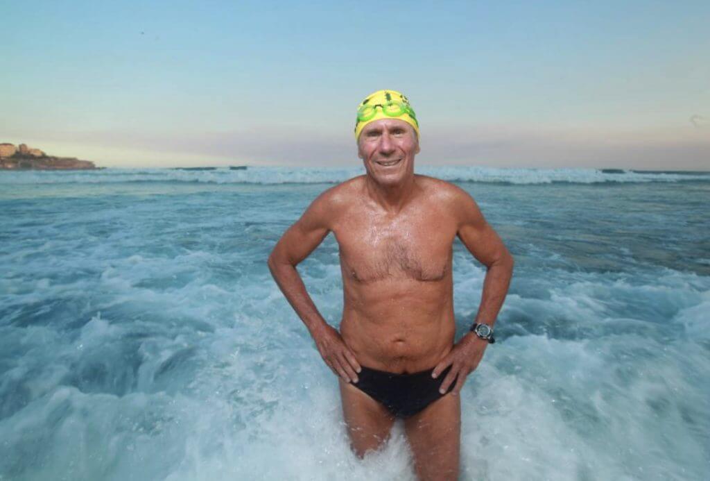 Cyril Baldock in surf at Bondi