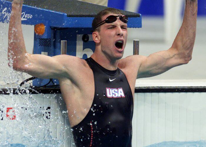 Tom Dolan of US celebrates after setting a new world record in the men's 400m individual medley final at the Sydney Olympics Games September 17, 2000. Dolan clocked four minutes 11.76 seconds for the new world record. CC/JDP