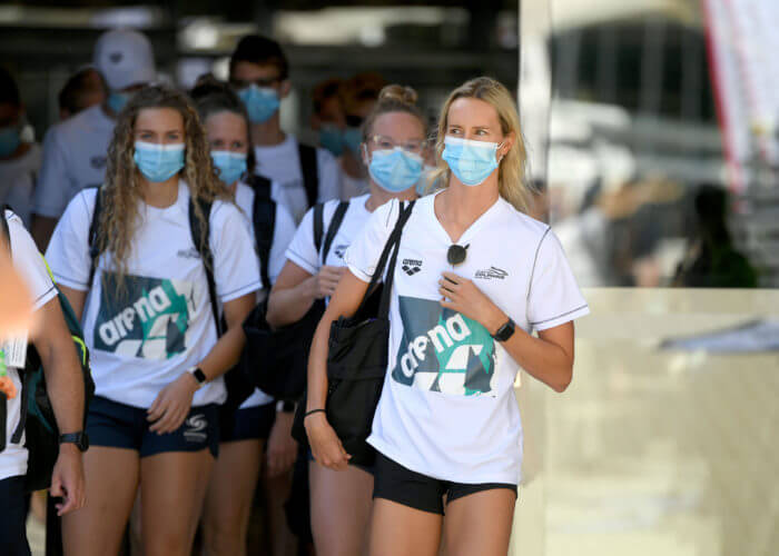 Emma McKeon entering pool wear Covid mask, Swimming Australia National Event Camp, Olympic Relays Simulation, Bond University Aquatic Centre, February 9 2021. Pic by Delly Carr / Swimming Australia. Pic credit mandatory for complimentary use.