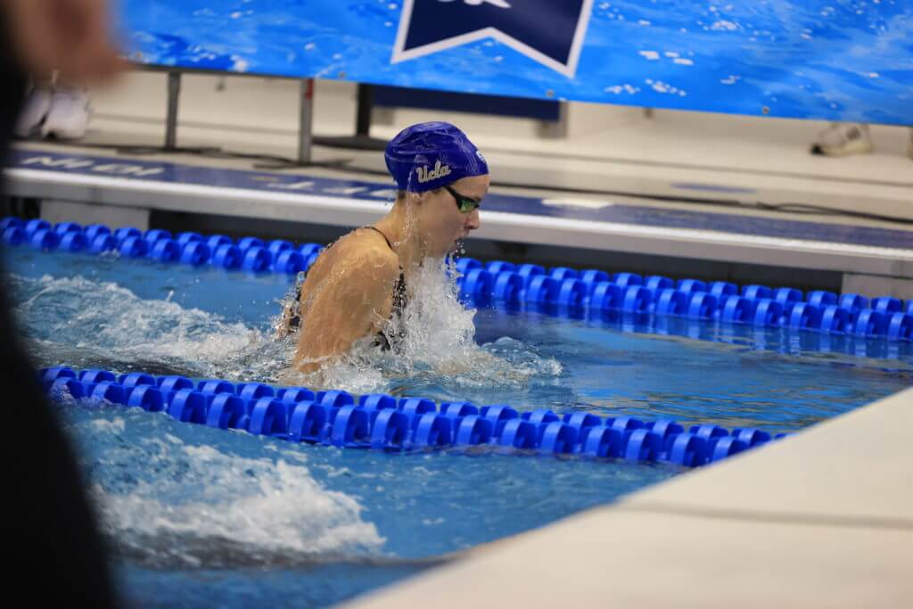 ucla-GREENSBORO, NC - MARCH 19: Swimmers compete in the 100 Breastroke Prelims on day three during the Division I Women’s Swimming & Diving Championships held at the Greensboro Aquatic Center on March 19, 2021 in Greensboro, North Carolina. (Photo by Carlos Morales/NCAA Photos via Getty Images)