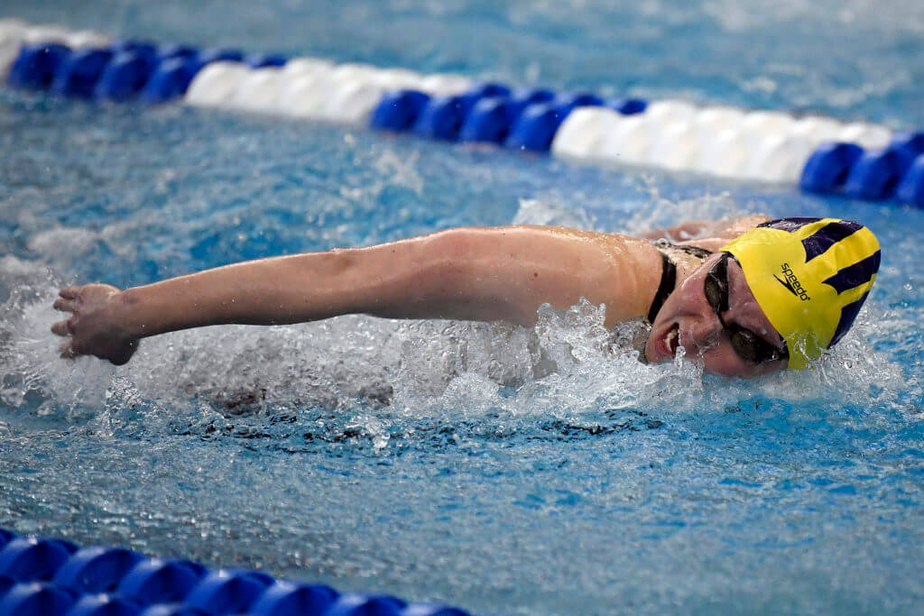 GREENSBORO, NORTH CAROLINA - MARCH 20: Olivia Carter of the Michigan Wolverines swims to victory in the 200 Yard Butterfly during the Division I Women’s Swimming & Diving Championships held at the Greensboro Aquatic Center on March 20, 2021 in Greensboro, North Carolina. (Photo by Mike Comer/NCAA Photos via Getty Images)
