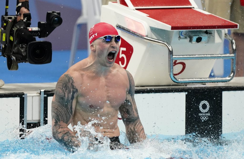 Jul 26, 2021; Tokyo, Japan; Adam Peaty (GBR) celebrates after winning the men's 100m breaststroke final during the Tokyo 2020 Olympic Summer Games at Tokyo Aquatics Centre. Mandatory Credit: Rob Schumacher-USA TODAY Sports