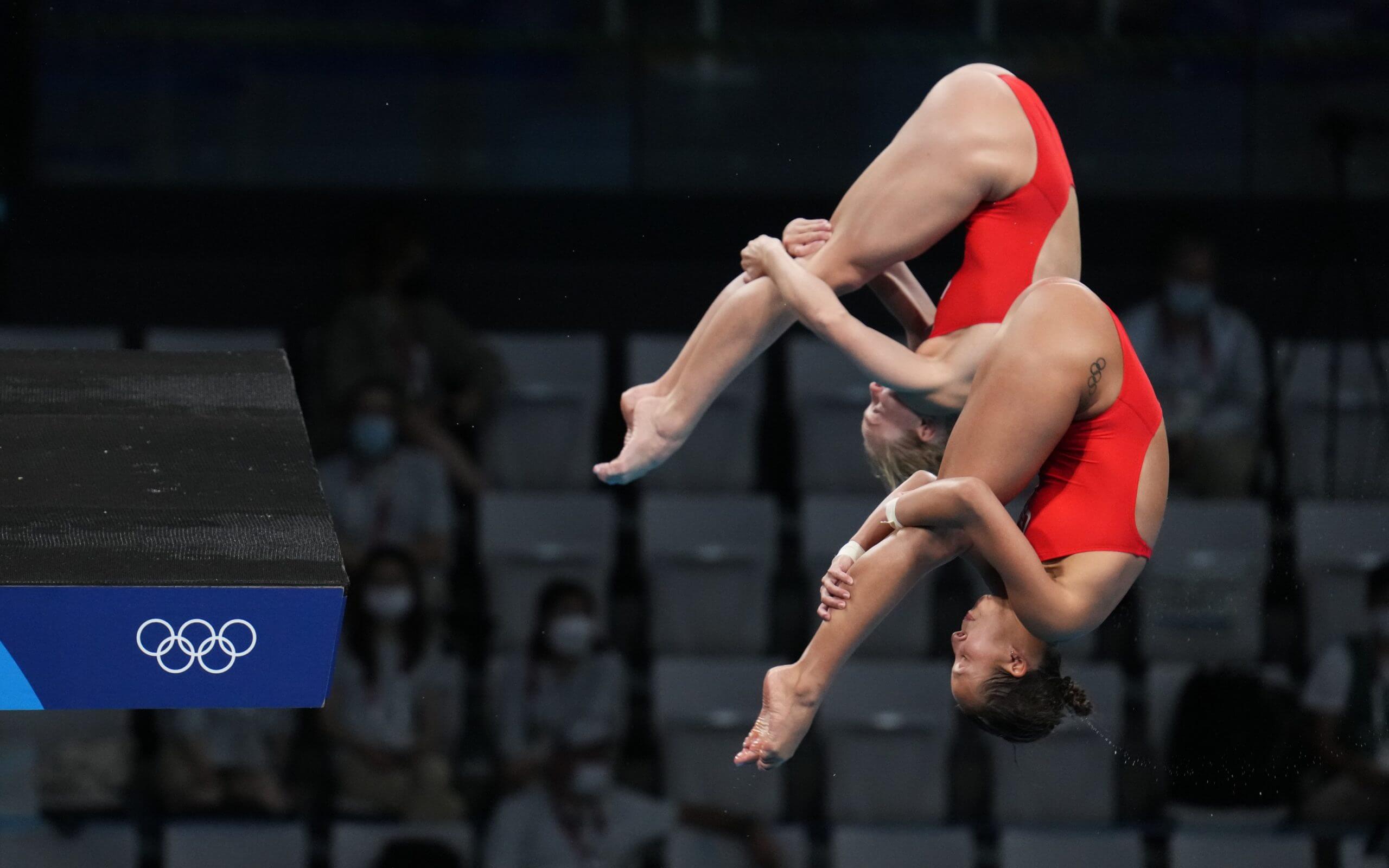 Jul 27, 2021; Tokyo, Japan; Jessica Parratto and Delaney Schnell (USA) in the women's 10m platform synchronized diving competition during the Tokyo 2020 Olympic Summer Games at Tokyo Aquatics Centre. Mandatory Credit: Robert Hanashiro-USA TODAY Sports