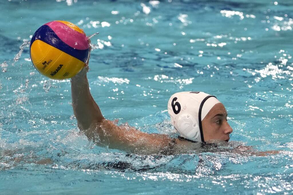 Jul 30, 2021; Tokyo, Japan; USA player Margaret Steffens (6) controls the balls against ROC during the Tokyo 2020 Olympic Summer Games at Tatsumi Water Polo Centre. Mandatory Credit: Michael Madrid-USA TODAY Sports