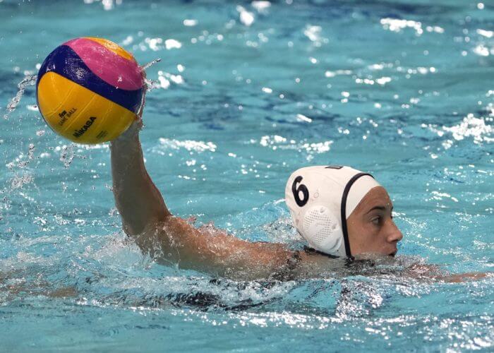 Jul 30, 2021; Tokyo, Japan; USA player Margaret Steffens (6) controls the balls against ROC during the Tokyo 2020 Olympic Summer Games at Tatsumi Water Polo Centre. Mandatory Credit: Michael Madrid-USA TODAY Sports