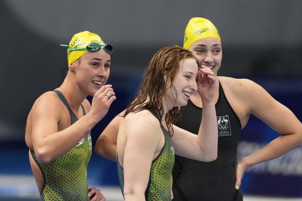 Jul 28, 2021; Tokyo, Japan; Australia relay team react after finishing first in their women's 4x200m freestyle relay heat during the Tokyo 2020 Olympic Summer Games at Tokyo Aquatics Centre. Mandatory Credit: Rob Schumacher-USA TODAY Sports
