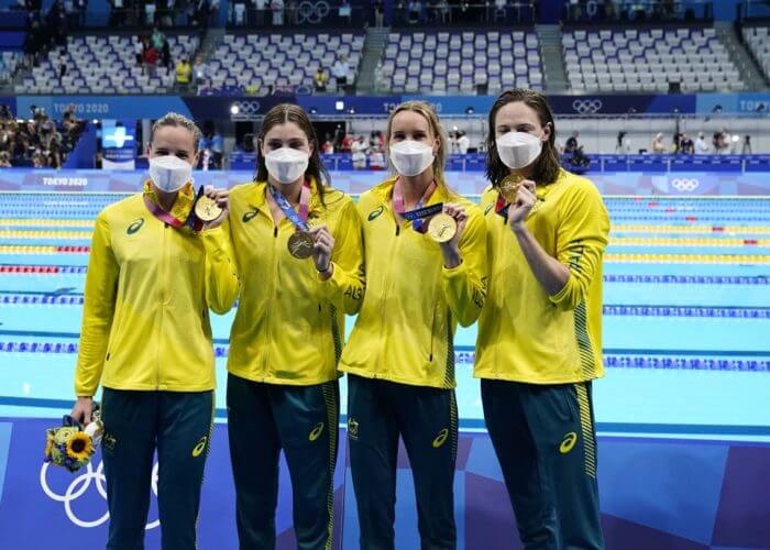 Jul 25, 2021; Tokyo, Japan; Team Australia members Bronte Campbell, Meg Harris, Emma McKeon and Cate Campbell celebrate their gold medal during the medals ceremony for the women's 4x100m freestyle relay during the Tokyo 2020 Olympic Summer Games at Tokyo Aquatics Centre. Mandatory Credit: Rob Schumacher-USA TODAY Network