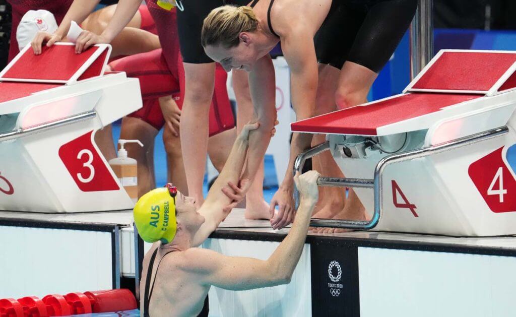 Jul 25, 2021; Tokyo, Japan; Cate Campbell (AUS) celebrates after anchoring Australia to a gold medal during the women's 4x100m freestyle relay final during the Tokyo 2020 Olympic Summer Games at Tokyo Aquatics Centre. Mandatory Credit: Robert Hanashiro-USA TODAY Network