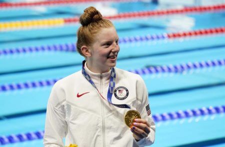 Jul 27, 2021; Tokyo, Japan; Lydia Jacoby (USA) with her gold medal during the medals ceremony for the women's 100m breaststroke during the Tokyo 2020 Olympic Summer Games at Tokyo Aquatics Centre. Mandatory Credit: Rob Schumacher-USA TODAY Sports
