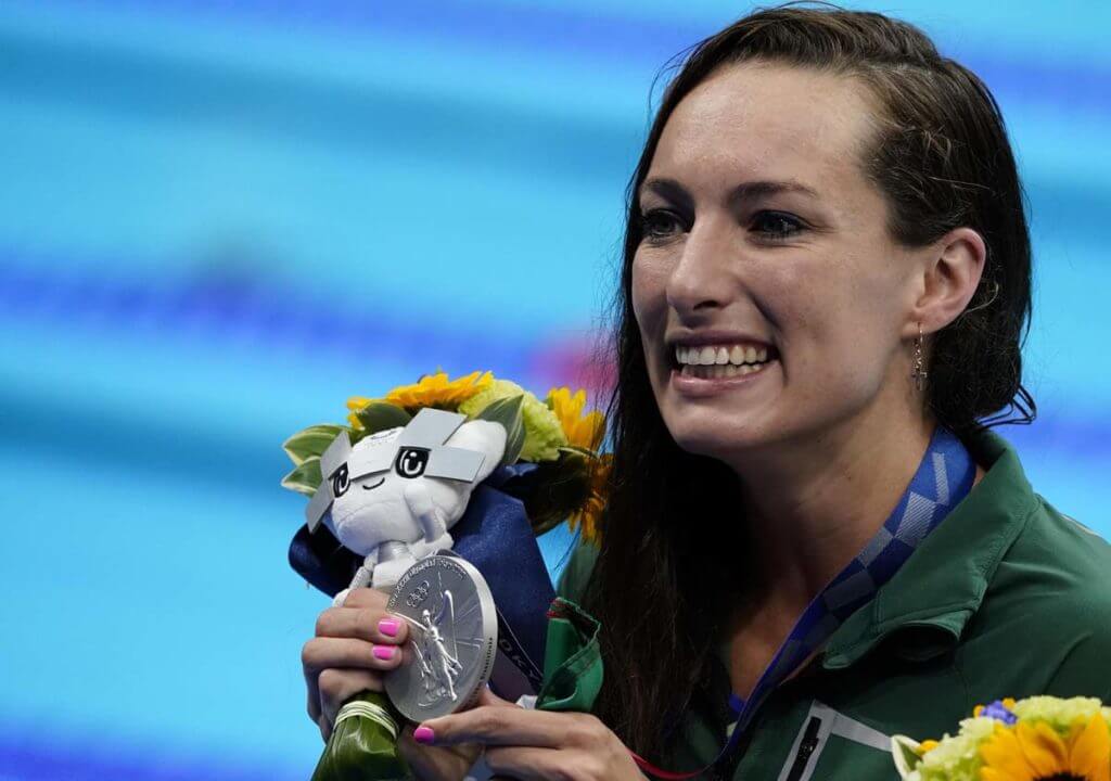 Jul 27, 2021; Tokyo, Japan; Tatjana Schoenmaker (RSA) shows off her silver medal during the medals ceremony for the women's 100m breaststroke during the Tokyo 2020 Olympic Summer Games at Tokyo Aquatics Centre. Mandatory Credit: Rob Schumacher-USA TODAY Sports