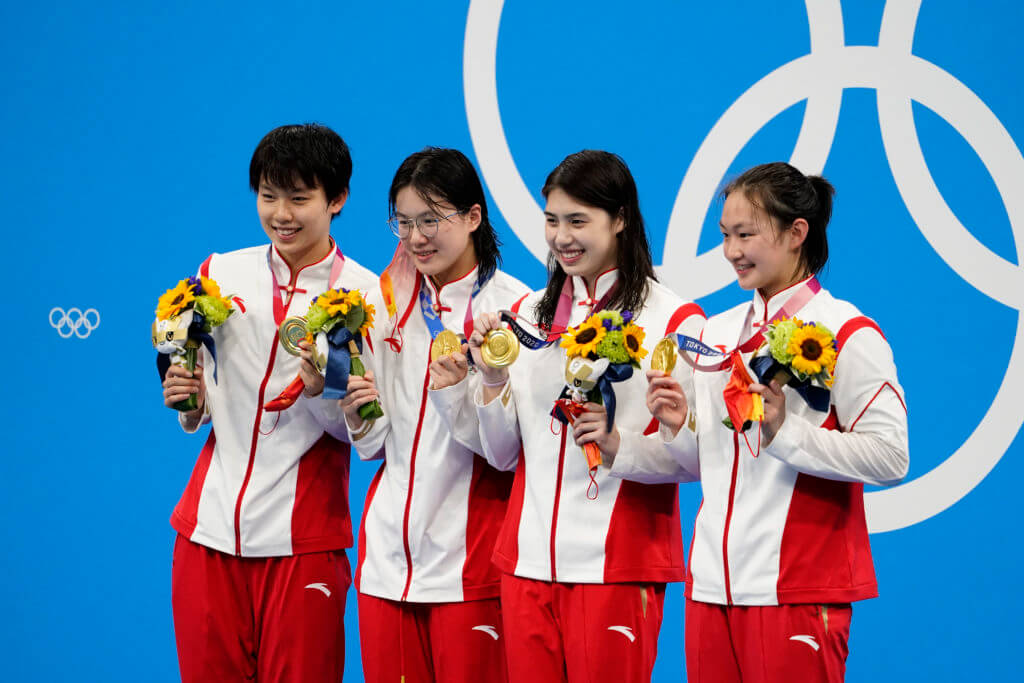Jul 29, 2021; Tokyo, Japan; China relay team poses with their gold medals during the medals ceremony for the women's 4x200m freestyle relay during the Tokyo 2020 Olympic Summer Games at Tokyo Aquatics Centre. Mandatory Credit: Rob Schumacher-USA TODAY Sports