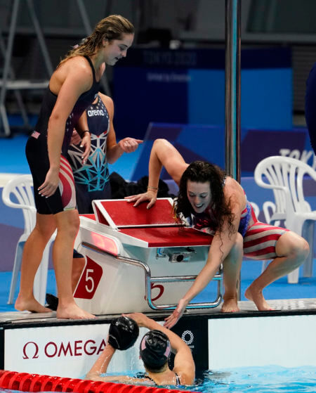 Jul 29, 2021; Tokyo, Japan; USA celebrates their silver in the women's 4x200m freestyle relay final during the Tokyo 2020 Olympic Summer Games at Tokyo Aquatics Centre. Mandatory Credit: Rob Schumacher-USA TODAY Sports