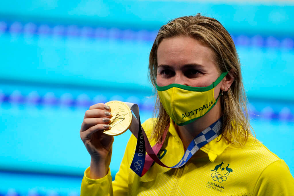 Jul 28, 2021; Tokyo, Japan; Ariarne Titmus (AUS) with her gold medal during the medals ceremony for the women's 200m freestyle during the Tokyo 2020 Olympic Summer Games at Tokyo Aquatics Centre. Mandatory Credit: Rob Schumacher-USA TODAY Sports