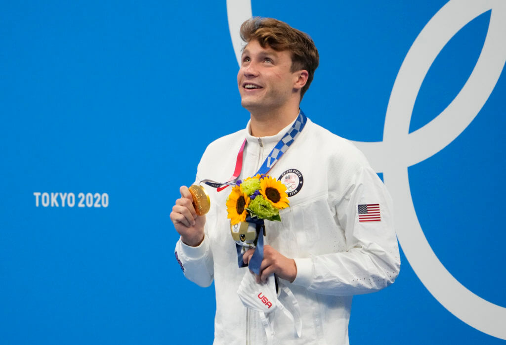 Jul 29, 2021; Tokyo, Japan; Robert Finke (USA) celebrates with his gold medal during the medals ceremony for the men's 800m freestyle during the Tokyo 2020 Olympic Summer Games at Tokyo Aquatics Centre. Mandatory Credit: Rob Schumacher-USA TODAY Sports
