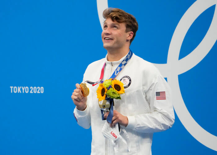 Jul 29, 2021; Tokyo, Japan; Robert Finke (USA) celebrates with his gold medal during the medals ceremony for the men's 800m freestyle during the Tokyo 2020 Olympic Summer Games at Tokyo Aquatics Centre. Mandatory Credit: Rob Schumacher-USA TODAY Sports