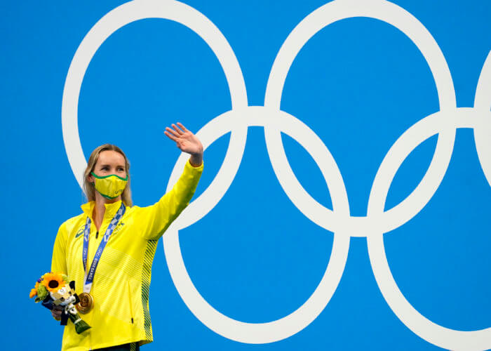 Jul 30, 2021; Tokyo, Japan; Emma McKeon (AUS) celebrates on the podium after winning the women's 100m freestyle final during the Tokyo 2020 Olympic Summer Games at Tokyo Aquatics Centre. Mandatory Credit: Grace Hollars-USA TODAY Sports