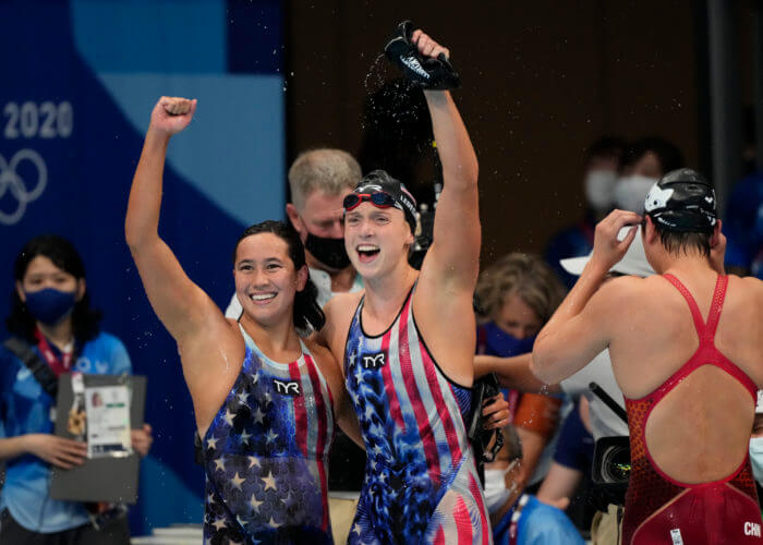 Jul 28, 2021; Tokyo, Japan; Katie Ledecky (USA) and Erica Sullivan (USA) celebrate after placing first and second in the women's 1500m freestyle final during the Tokyo 2020 Olympic Summer Games at Tokyo Aquatics Centre. Mandatory Credit: Rob Schumacher-USA TODAY Sports