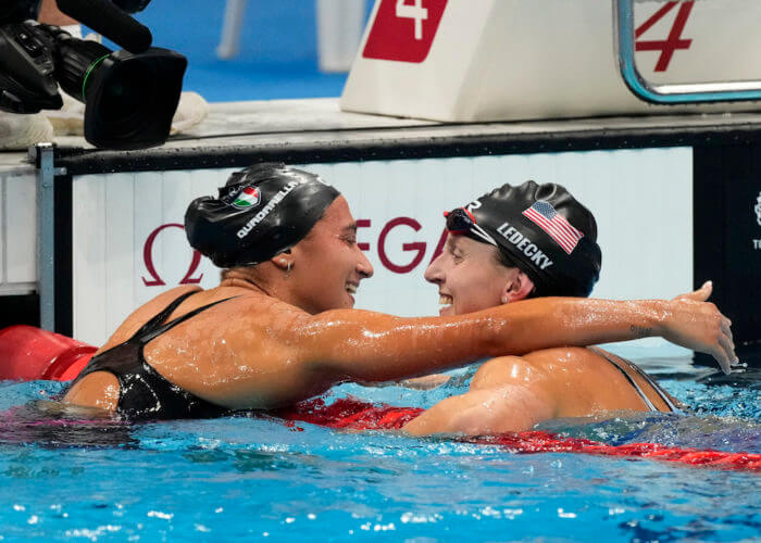 Jul 31, 2021; Tokyo, Japan; Katie Ledecky (USA) and Simona Quadarella (ITA) hug after placing first and third in the women's 800m freestyle final during the Tokyo 2020 Olympic Summer Games at Tokyo Aquatics Centre. Mandatory Credit: Rob Schumacher-USA TODAY Sports