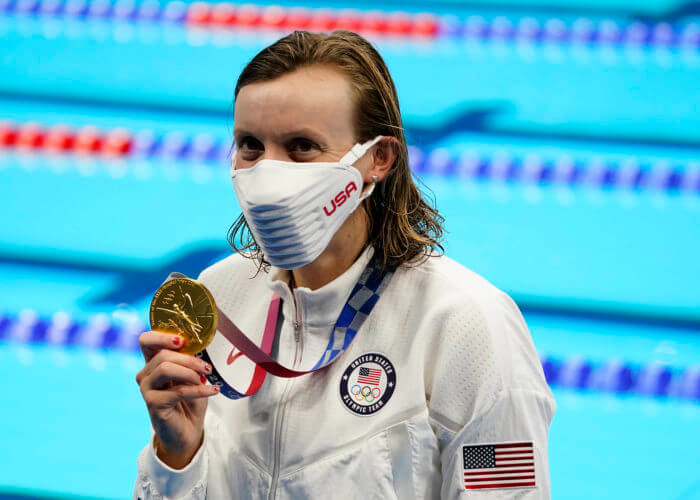 Jul 31, 2021; Tokyo, Japan; Katie Ledecky (USA) celebrates her gold medal during the medals ceremony for the women's 800m freestyle during the Tokyo 2020 Olympic Summer Games at Tokyo Aquatics Centre. Mandatory Credit: Rob Schumacher-USA TODAY Sports