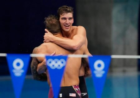 Aug 1, 2021; Tokyo, Japan; Caeleb Dressel (USA) and Zach Apple celebrate their victory in the men's 4x100m medley final during the Tokyo 2020 Olympic Summer Games at Tokyo Aquatics Centre. Mandatory Credit: Rob Schumacher-USA TODAY Sports
