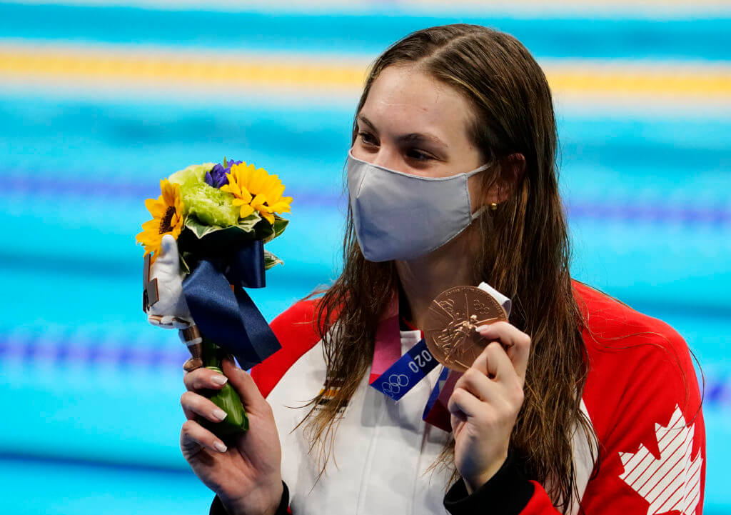 Jul 28, 2021; Tokyo, Japan; Penny Oleksiak (CAN) with her bronze medal during the medals ceremony for the women's 200m freestyle during the Tokyo 2020 Olympic Summer Games at Tokyo Aquatics Centre. Mandatory Credit: Rob Schumacher-USA TODAY Sports