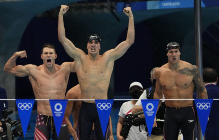 Aug 1, 2021; Tokyo, Japan; Ryan Murphy (USA) and Caeleb Dressel (USA) and Zach Apple (USA) celebrate after winning the men's 4x100m medley final during the Tokyo 2020 Olympic Summer Games at Tokyo Aquatics Centre. Mandatory Credit: Rob Schumacher-USA TODAY Sports