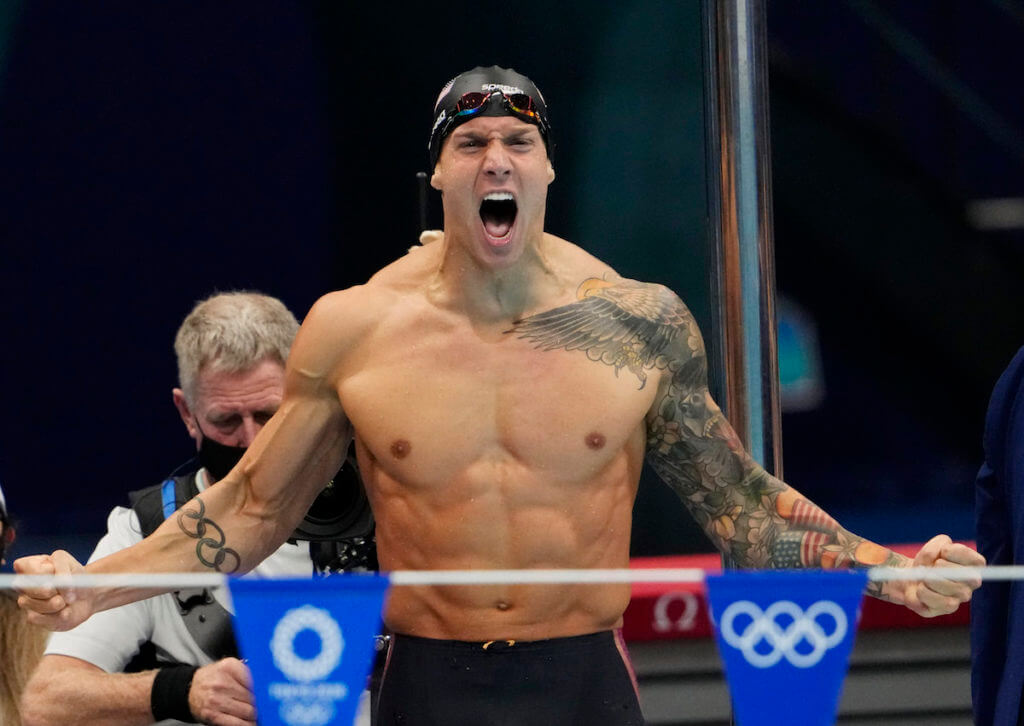 Aug 1, 2021; Tokyo, Japan; Caeleb Dressel (USA) celebrates after winning the men's 4x100m medley final during the Tokyo 2020 Olympic Summer Games at Tokyo Aquatics Centre. Mandatory Credit: Rob Schumacher-USA TODAY Sports