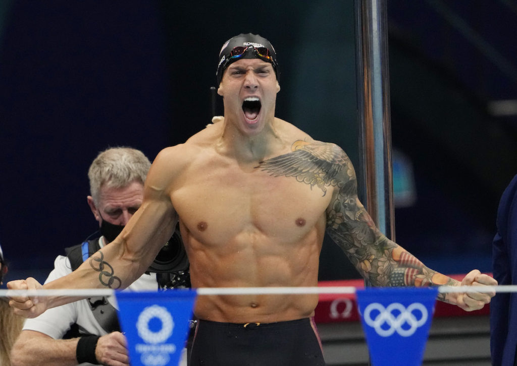 Aug 1, 2021; Tokyo, Japan; Caeleb Dressel (USA) celebrates after winning the men's 4x100m medley final during the Tokyo 2020 Olympic Summer Games at Tokyo Aquatics Centre. Mandatory Credit: Rob Schumacher-USA TODAY Sports