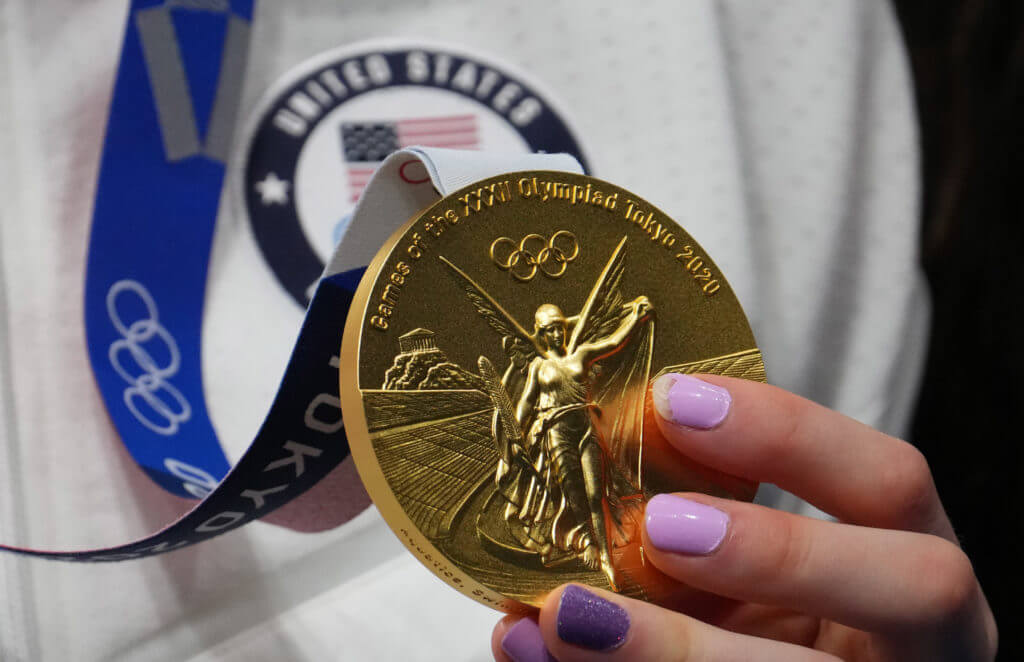 Jul 27, 2021; Tokyo, Japan; Lydia Jacoby (USA) holds her gold medal during the medals ceremony for the women's 100m breaststroke during the Tokyo 2020 Olympic Summer Games at Tokyo Aquatics Centre. Mandatory Credit: Robert Hanashiro-USA TODAY Sports