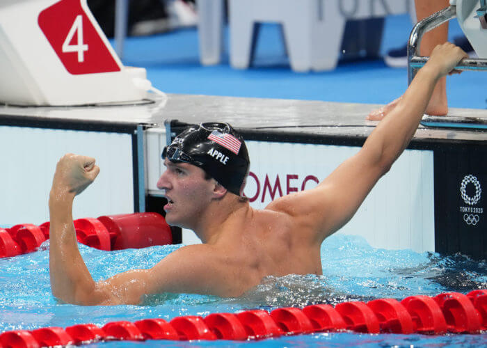 Jul 26, 2021; Tokyo, Japan; Zach Apple (USA) celebrates after anchoring the team to a gold medal in the men's 4x100m freestyle relay final during the Tokyo 2020 Olympic Summer Games at Tokyo Aquatics Centre. Mandatory Credit: Robert Hanashiro-USA TODAY Sports