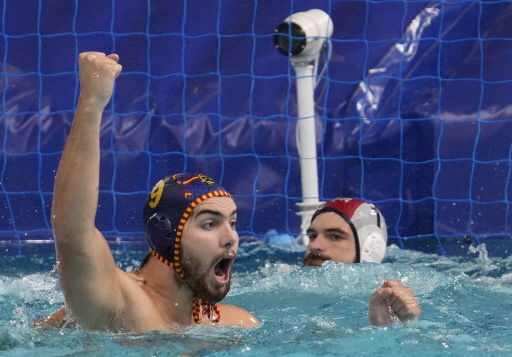 Aug 4, 2021; Tokyo, Japan; Team Spain centre forward Roger Tahull Compte (9) celebrates a goal against USA in a men's water polo quarterfinal during the Tokyo 2020 Olympic Summer Games at Tatsumi Water Polo Centre. Mandatory Credit: Robert Hanashiro-USA TODAY Sports