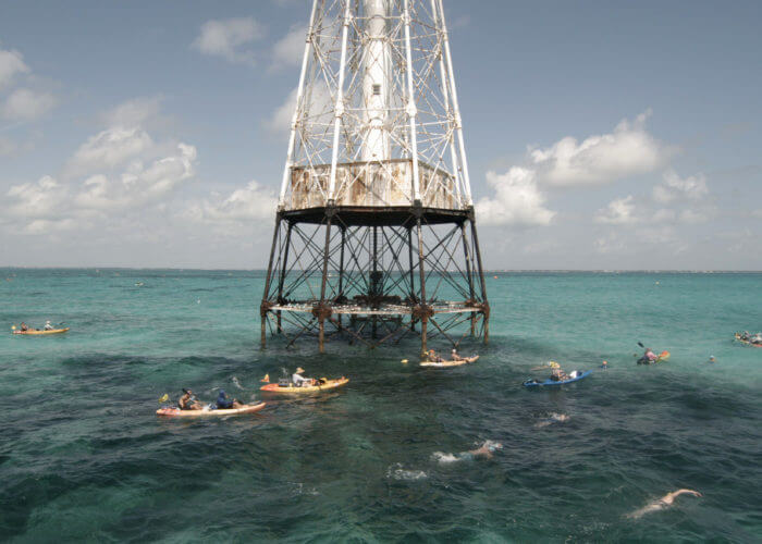 Competitors in the Swim for Alligator Lighthouse, an open-water, long-distance event, round the Florida Keys lighthouse and head to shore Saturday, Sept. 11, 2021, near Islamorada, Fla. The event began in 2013 to help raise awareness about preserving the almost 150-year-old lighthouse as well as five other lighthouses off the Keys. This year’s contest attracted 461 swimmers. FOR EDITORIAL USE ONLY (Steve Panariello/Florida Keys News Bureau/HO)
