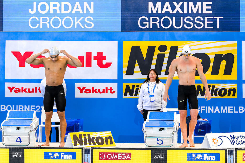 Jordan Crooks of Cayman Islands, Maxime Grousset of France prepare to compete in the 100m Freestyle Men Final during the FINA Swimming Short Course World Championships at the Melbourne Sports and Aquatic Centre in Melbourne, Australia, December 15th, 2022. Photo Giorgio Scala / Deepbluemedia / Insidefoto