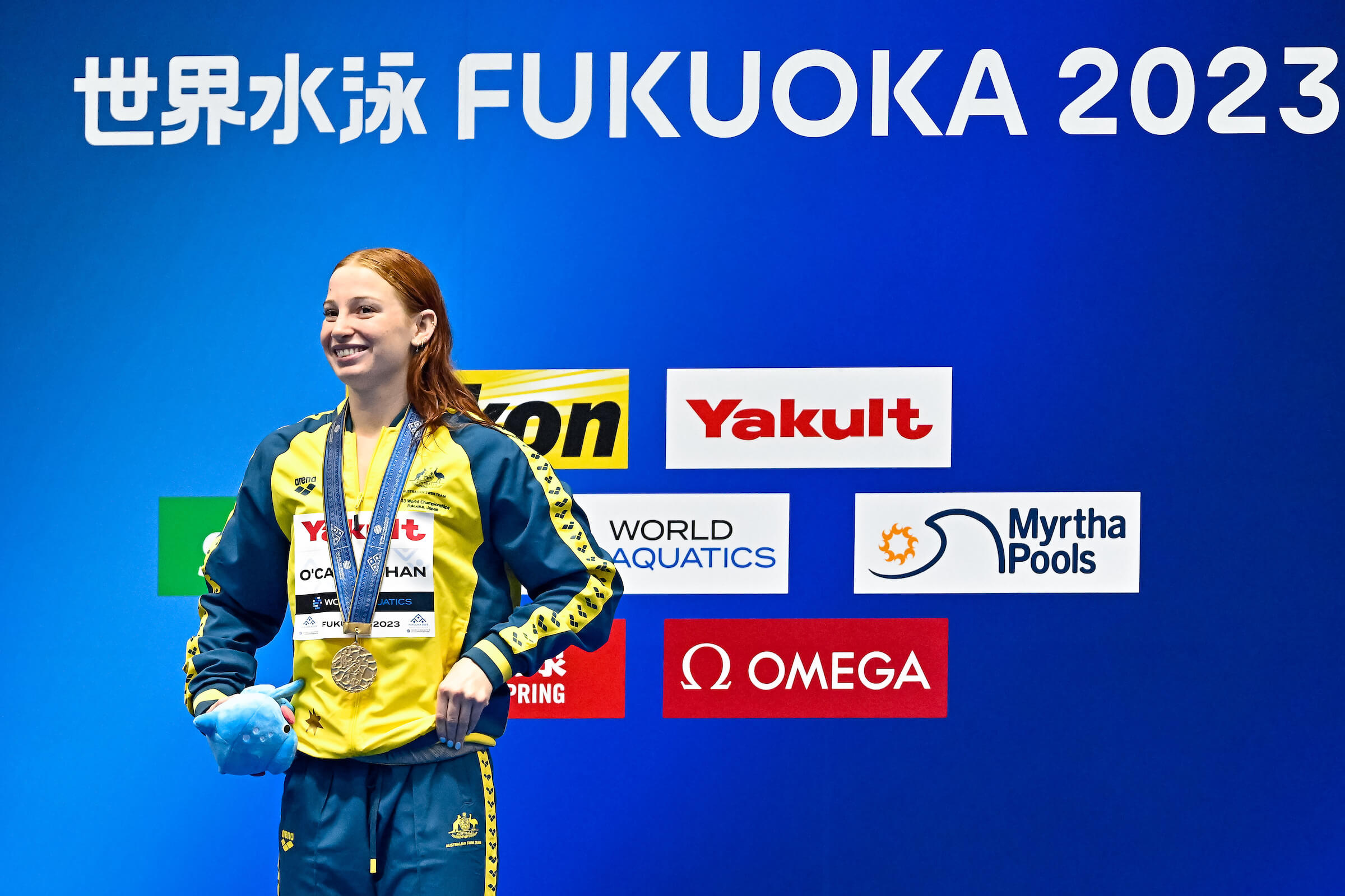 Mollie O'callaghan of Australia stands with the gold medal after competing in the 100m Freestyle Women Final during the 20th World Aquatics Championships at the Marine Messe Hall A in Fukuoka (Japan), July 28th, 2023.