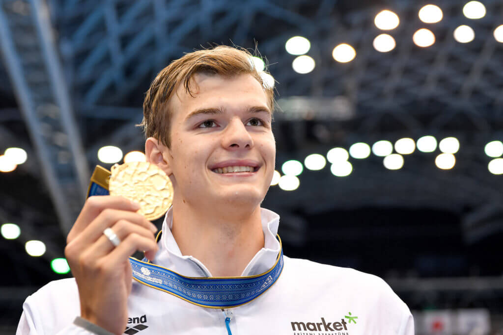 Hubert Kos of Hungary shows the gold medal after competing in the 200m Backstroke Men Final during the 20th World Aquatics Championships at the Marine Messe Hall A in Fukuoka (Japan), July 28th, 2023.