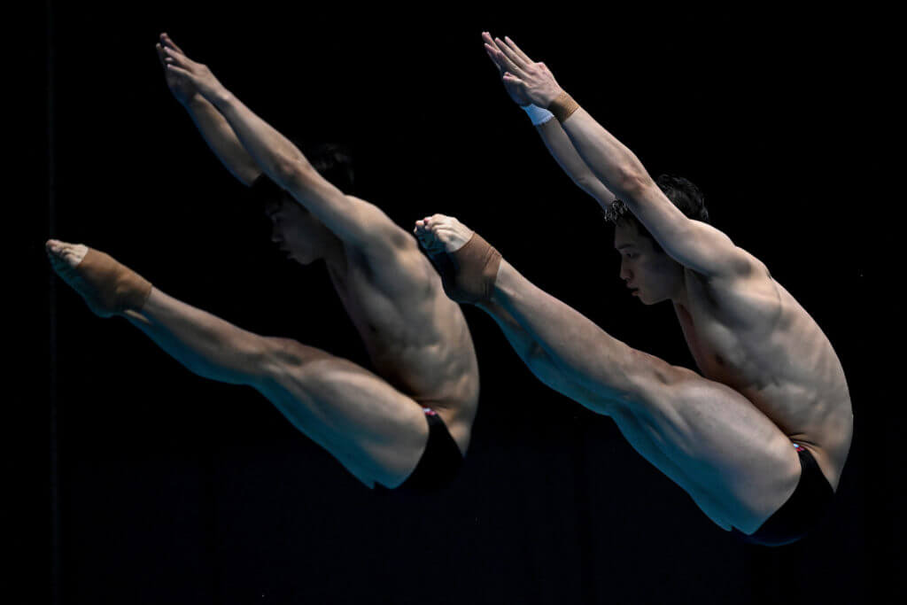 Daoyl Long and Zongyuan Wang of China compete in the Synchronized 3m springboard men final during the 20th World Aquatics Championships at the Fukuoka Prefectural Pool in Fukuoka (Japan), July 15th, 2023.