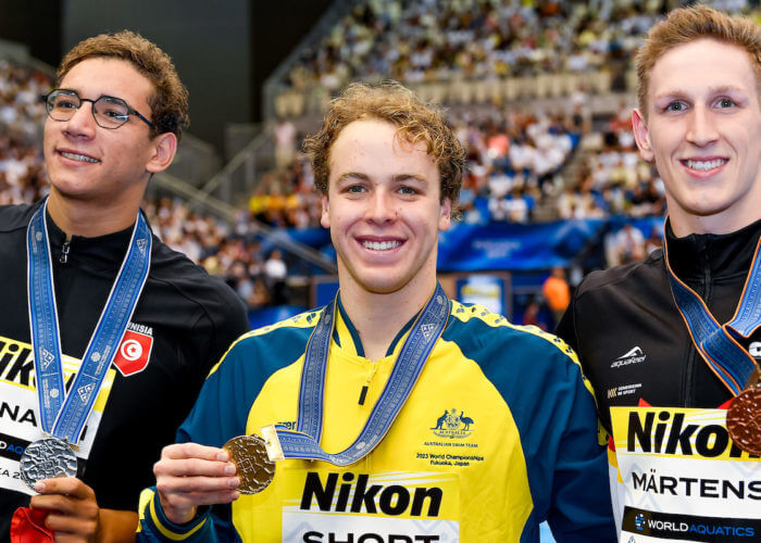 Ahmed Hafnaoui of Tunisia, silver, Samuel Short of Australia, gold, Lukas Martens of Germany, bronze show the medals after competing in the 400m Freestyle Men Final during the 20th World Aquatics Championships at the Marine Messe Hall A in Fukuoka (Japan), July 23rd, 2023.