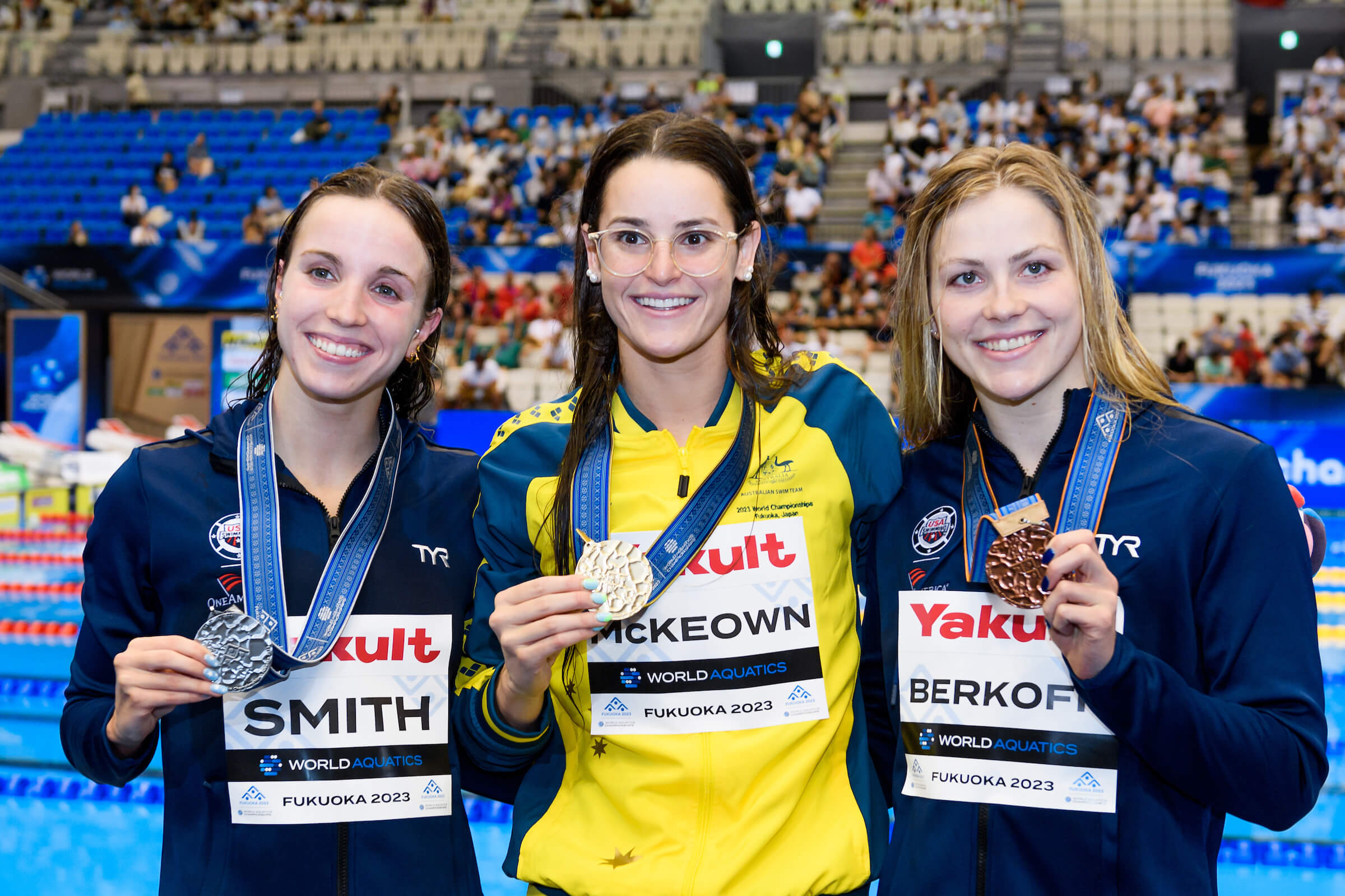 Regan Smith of United States of America, silver, Kaylee Mckeown of Australia, gold, Katharine Berkoff of United States of America, bronze show the medals after competing in the 100m Backstroke Women Final during the 20th World Aquatics Championships at the Marine Messe Hall A in Fukuoka (Japan), July 25th, 2023.