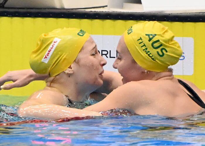 Mollie and Arnie emnbrace Photo Delly Carr Swimming Australia