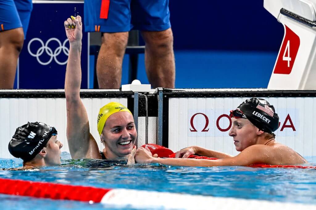 Summer Mcintosh of Canada, silver, Ariarne Titmus of Australia, gold, Katie Ledecky of United States of America, bronze react after competing in the swimming 400m Freestyle Women Final during the Paris 2024 Olympic Games at La Defense Arena in Paris (France), July 27, 2024.
