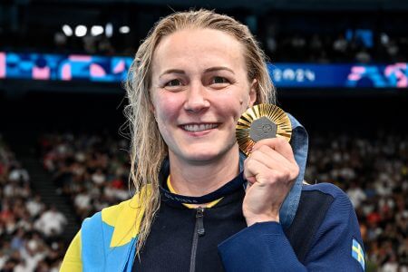 Sarah Sjoestroem of Sweden shows the gold medal after competing in the swimming 100m Freestyle Women Final during the Paris 2024 Olympic Games at La Defense Arena in Paris (France), July 31, 2024.