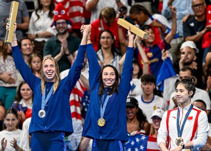 Gretchen Walsh of United States of America, silver, Torri Huske of United States of America, gold, Yufei Zhang of China, bronze stand with the medals after competing in the swimming 100m Butterfly Women Final during the Paris 2024 Olympic Games at La Defense Arena in Paris (France), July 28, 2024.