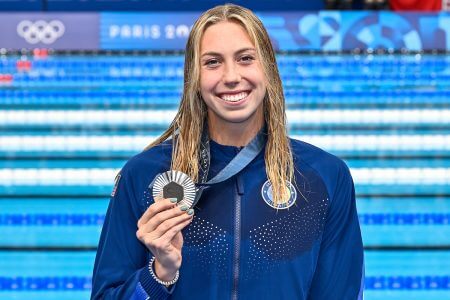 Gretchen Walsh of United States of America shows the silver medal after competing in the swimming 100m Butterfly Women Final during the Paris 2024 Olympic Games at La Defense Arena in Paris (France), July 28, 2024.